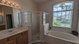 Spacious rental Highlands Reserve Villa in Orlando complete with stunning Master ensuite bathroom #1 with bath, walk-in shower & his 'n' hers sinks & separate WC