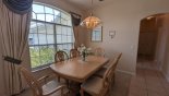 Spacious rental Highlands Reserve Villa in Orlando complete with stunning Dining area with dining table & 6 chairs - views onto front gardens