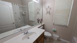 Master ensuite bathroom #2 with bath & shower over - also serves as the pool bathroom with this Orlando Villa for rent direct from owner