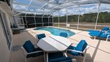 Madison + 2 Villa rental near Disney with Pool deck with patio table with 6 chairs - retractable sunshade can be used if shade required