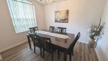 Spacious rental Highlands Reserve Villa in Orlando complete with stunning Dining room off entrance foyer with dining table & 6 chairs - views onto front gardens