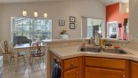 Kitchen viewed towards dining area from Highlands Reserve rental Villa direct from owner