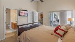 Master bedroom viewed towards ensuite bathroom from Highlands Reserve rental Villa direct from owner