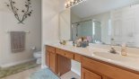 Master ensuite bathroom with bath, walk-in shower & his 'n' hers sinks & WC with this Orlando Villa for rent direct from owner