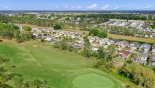 Orlando Villa for rent direct from owner, check out the Aerial view of golf course & villa obscured by trees