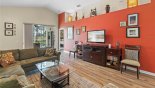 Spacious rental Highlands Reserve Villa in Orlando complete with stunning Living room with views & access onto the pool deck