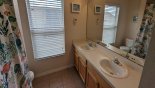 Orlando Villa for rent direct from owner, check out the Upstairs family bathroom #2 with bath & shower over, his & hers sinks and WC