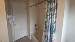 Upstairs family bathroom #2 with bath & shower over, his & hers sinks and WC with this Orlando Villa for rent direct from owner