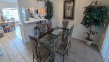 Orlando Villa for rent direct from owner, check out the Dining area adjacent to kitchen with dining table seating 6 and views & access onto pool deck