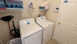 Villa rentals near Disney direct with owner, check out the Laundry room with washer, dryer, iron & ironing board