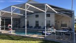 View of pool deck from rear gardens from Highlands Reserve rental Villa direct from owner