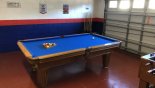 Games room with slate bed pool table. with this Orlando Villa for rent direct from owner