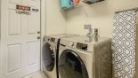 Villa rentals near Disney direct with owner, check out the Laundry room with washer, dryer, iron & ironing board