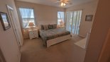 Villa rentals near Disney direct with owner, check out the Master #1 bedroom with king sized bed and private access & views onto pool deck