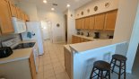 Breakfast bar with 2 bar stools from Ashley 1 Villa for rent in Orlando