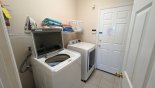 Villa rentals in Orlando, check out the Laundry room with washer, dryer, iron & ironing board