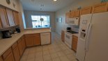 Fully fitted open plan kitchen with quality appliances from Highlands Reserve rental Villa direct from owner