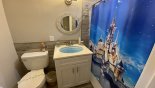 Family bathroom #4 with bath & shower over, single vanity & WC from Mystical 1 Villa for rent in Orlando