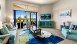 Baywood 1 Villa rental near Disney with Living room with wall mounted LCD Roku TV & views onto pool deck
