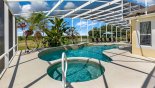 Enormous wrap around pool deck with large lagoon pool & spa - SW facing golf course views with this Orlando Villa for rent direct from owner