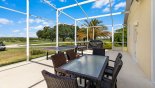 Outdoor dining area with awning retracted from Baywood 1 Villa for rent in Orlando