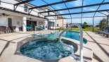 Spa and pool both have handrails to assist entry and exit - www.iwantavilla.com is the best in Orlando vacation Villa rentals
