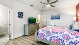 Master bedroom #2 with LCD TV - www.iwantavilla.com is the best in Orlando vacation Villa rentals