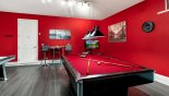 Games room with AC, pool table, air hockey, table foosball, TV & Xbox from Solterra Resort rental Villa direct from owner