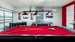 Games room with AC, pool table, air hockey, table foosball, TV & Xbox with this Orlando Villa for rent direct from owner