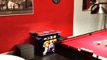 Games room with retro table top gaming machine from Versailles 1 Villa for rent in Orlando