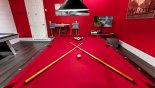 Games room with AC, pool table, air hockey, table foosball, TV & Xbox - www.iwantavilla.com is your first choice of Villa rentals in Orlando direct with owner