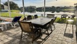 Villa rentals near Disney direct with owner, check out the Patio table with 6 comfortable chairs on pool deck