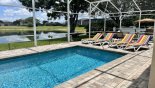 Pool deck with 4 sun loungers with this Orlando Villa for rent direct from owner