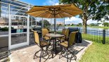 Captiva 1 Villa rental near Disney with Additional high-top dining table with 4 chairs and adjacent free gas BBQ outside pool cage