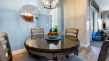 Villa rentals near Disney direct with owner, check out the Breakfast nook next to the kitchen with seating for 4 - additional seating at breakfast bar