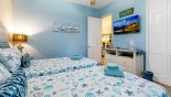 Villa rentals near Disney direct with owner, check out the Bedroom #3 with wall mounted LCD Smart TV