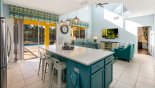 Spacious rental Emerald Island Resort Villa in Orlando complete with stunning Kitchen viewed towards family room