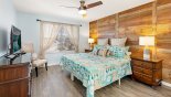 Bedroom #4 wih barnwood feature wall which can either be configured as a king or 2 x XL twins from Emerald Island Resort rental Villa direct from owner