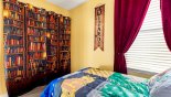 Magna Bay 1 Villa rental near Disney with Book themed curtain conceals large closet - wall mounted LCD Smart TV to left of curtain