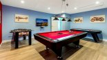 Spacious rental Formosa Gardens Villa in Orlando complete with stunning Air conditioned games room, with pool table, table foosball, air hockey, and large TV with Xbox One