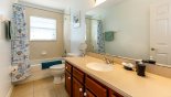 Villa rentals in Orlando, check out the Family bathroom #5 with bath & shower over, single sink & WC