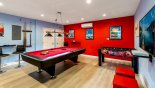 Air conditioned games room, with pool table, table foosball, air hockey, and large TV with Xbox One from Formosa Gardens rental Villa direct from owner