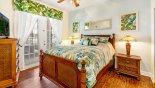 Villa rentals near Disney direct with owner, check out the Bedroom #4 with queen sized bed and private access onto pool deck via French doors