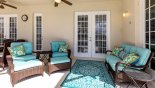 Orlando Villa for rent direct from owner, check out the Covered lanai with comfortable seating to relax and watch the kids enjoying themselves on the pool