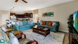 Family room viewed towards kitchen - www.iwantavilla.com is the best in Orlando vacation Villa rentals