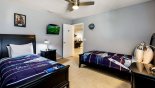 Orlando Villa for rent direct from owner, check out the Bedroom #7 with wall mounted Roku enabled LCD Smart TV