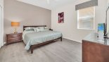 Ground floor bedroom #6 with king sized bed from Coconut Palm 2 Villa for rent in Orlando