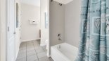 Jack & Jill bathroom #4 with bath & shower over, WC plus a sink either side from Coconut Palm 2 Villa for rent in Orlando