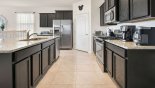 Fully fitted kitchen with all new stainless steel appliances and granite counter tops from St Lucia 2 Villa for rent in Orlando