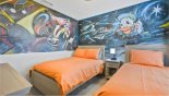 Spacious rental Solterra Resort Villa in Orlando complete with stunning Bedroom #4 with graffiti Donald Duck theming and a full size & twin bed